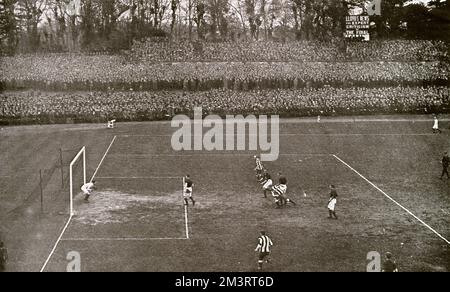 Newcastle United vs. Barnsley in the F.A. Cup Final at the Crystal Palace, 1910. Barnsley's goalkeeper saving. The match was a one-all draw and had to be re-played at Everton.     Date: 1910 Stock Photo