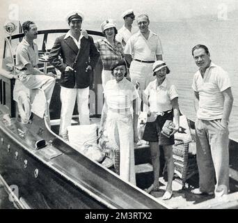 People on a boat trip, Cap d'Antibes, Cote d'Azur, France - Mrs Irving Netcher (Rosie Dolly), Mrs Roy Royston, Monsieur Rene Fonjellaz Swiss bobbing champion), Michael Arlen, Irving Netcher, Mrs Grahame White (Ethel Levey) and Eddie Dolly.      Date: 1933 Stock Photo