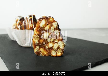 dessert anthill Russian Belarusian Ukrainian cake anthill on a gray tray with a place for text copyspace. Sweet dessert. Stock Photo