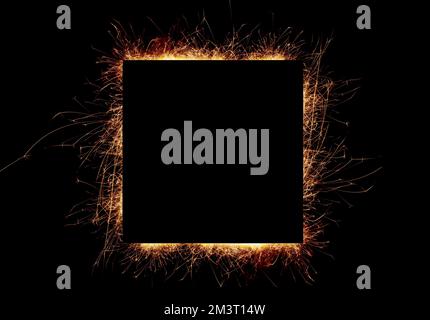 Sparkles square frame on a black background. Stock Photo