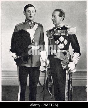Admiral of the Fleet Sir Roger Keyes, with his son Geoffrey in a the full dress uniform of a subaltern in the Royal Scots Greys. The photograph was taken after Geoffrey's presentation at a levee in 1937.     Date: 1937 Stock Photo