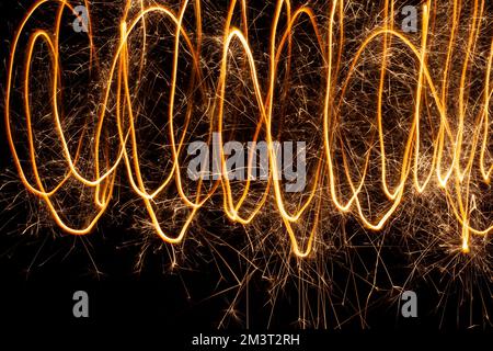 Abstract spiral with sparks of Bengal fire. Holiday fireworks Stock Photo