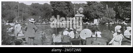 Tilting in canoes at Wargrave Regatta on the River Thames in Wargrave in Berkshire. Stock Photo
