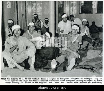 Young Cypriot men with bandaged heads inside a hospital in Famagusta who claimed to have been injured following a widespread round-up of 650 suspects by British troops following the murder of the wife of a Sergeant (Mrs D J Cutliffe) on October 3, 1958 Stock Photo