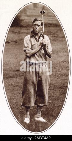 King Edward VIII when Prince of Wales, pictured playing golf at Walton Heath club in 1933. The Prince is wearing a typically flamboyant ensemble of checked socks, plus fours and casual checked polo shirt. Stock Photo