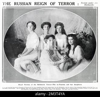Photograph showing the reports that the Russian ex-Tsaritsa and her daughters had been killed by Bolsheviks. On the 16th -17th of July, the Russian Imperial Romanov family (Nicholas II of Russia, his wife Alexandra Feodorovna, and their five children: Olga, Tatiana, Maria, Anastasia, and Alexei) were shot and bayoneted to death, by Bolshevik revolutionaries Stock Photo