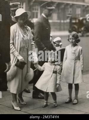 The Duchess of York with her daughters, Princess Elizabeth (Queen Elizabeth II) and Princess Margaret Rose, seen arriving at Olympia for the Royal Tournament. Stock Photo