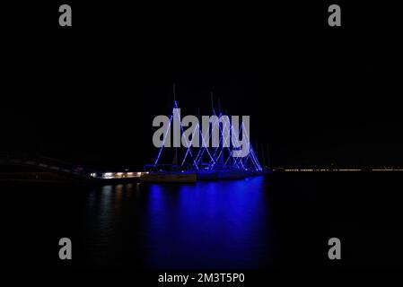 Sailboat Holiday Lights, Christmas Lights, port of the beautiful city of Volos, Greece Stock Photo