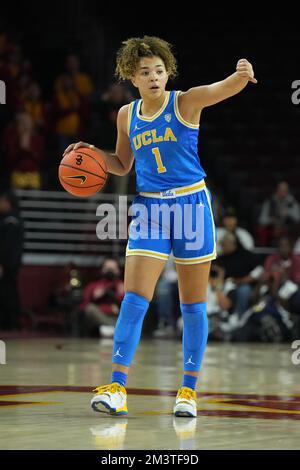 UCLA guard Kiki Rice (1) dribbles against Ohio State guard Kennedy