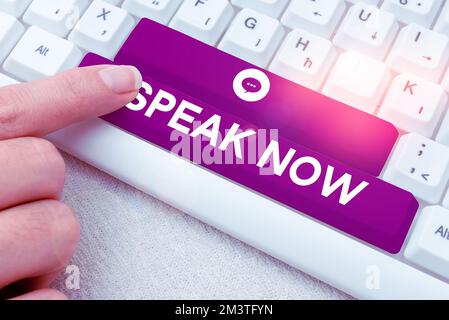 Sign displaying Speak Now. Word for Communicate to us your feelings and information Voice out Stock Photo