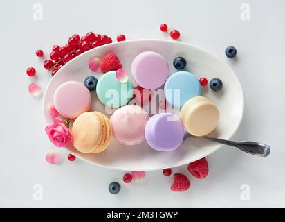 Photo of color containers for cosmetic products on the white plate Stock Photo