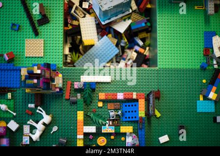 Multicolored plastic kids building blocks table. Stock Photo