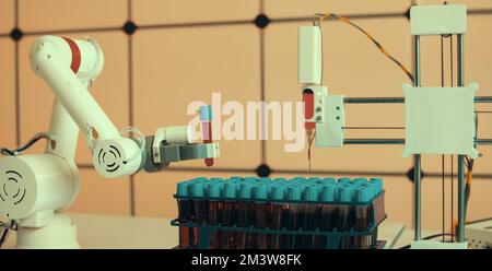 Robotic arm holding blood sample Stock Photo
