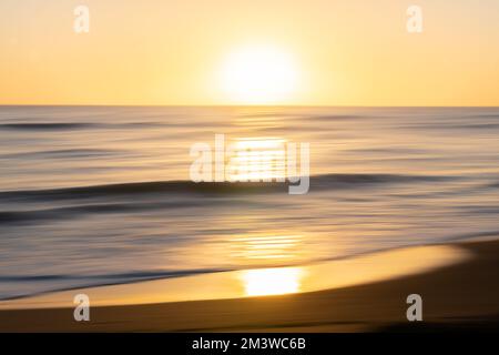 Golden hour coastal abstract Impressionist coastal abstract form and color at sunset. Stock Photo