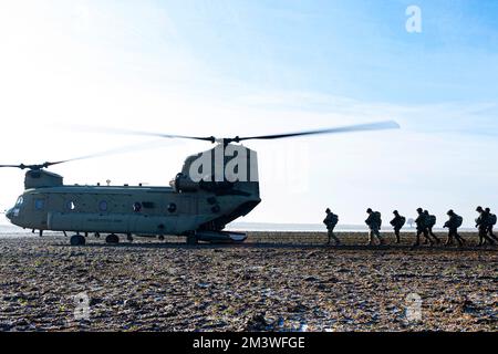 December 13, 2022 - Rheinland-Pfalz, Germany - Jumpers board a 214th Aviation Regiment Boeing CH-47 Chinook helicopter prior to a parachute jump at Alzey drop zone in Ober-FlÃ¶rsheim, Germany, December. 13, 2022. U.S. Army Soldiers from 214th AVN, U.S. Air Force Airmen from the 435th Contingency Squadron based at Ramstein Air Base, Germany, and partner and allied nations trained to become more proficient parachutists and strengthen their partnership in the pursuit of providing air and ground support wherever it may be needed. Allied forces in Europe regularly train together to ensure timely Stock Photo