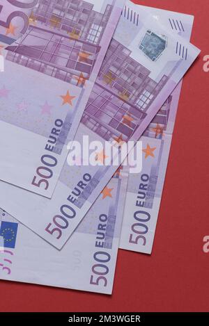 500 euro banknotes on a red background close up Stock Photo