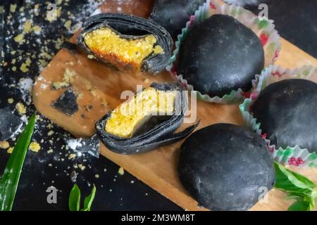 Traditional Indonesian cake called Bakpia filled with green beans Stock Photo