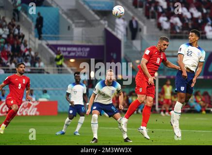 File photo dated 21-11-2022 of England's Jude Bellingham (right) scores their side's first goal of the game during the FIFA World Cup Group B match at the Khalifa International Stadium, Doha. England were beaten by defending champions France in the World Cup quarter-finals. Gareth Southgate’s men promised much in Qatar but fell short in their quest for glory as issues from the spot proved an all too familiar problem at this World Cup. Issue date: Saturday December 17, 2022. Stock Photo