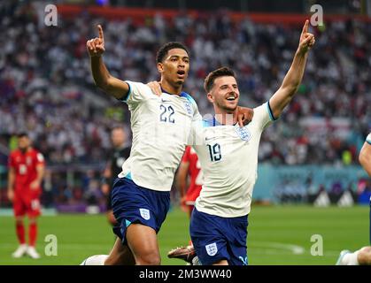 File photo dated 21-11-2022 of England's Jude Bellingham celebrates scoring their side's first goal of the game with team-mate Mason Mount during the FIFA World Cup Group B match at the Khalifa International Stadium, Doha. England were beaten by defending champions France in the World Cup quarter-finals. Gareth Southgate’s men promised much in Qatar but fell short in their quest for glory as issues from the spot proved an all too familiar problem at this World Cup. Issue date: Saturday December 17, 2022. Stock Photo