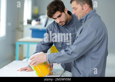 portrait of painter with apprentice Stock Photo