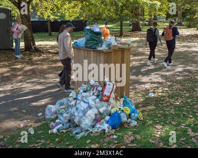 Overflowing public rubbish bins in St James Park, London, UK. Stock Photo
