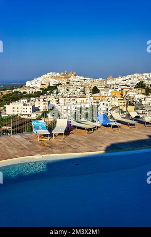 Apulia Puglia Italy. Ostuni. Elevated view of the town from the a rooftop pool Stock Photo