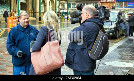 Glasgow, Scotland, UK 17th December, 2022. GMT rail strike saw a picket line outside central station with empty timetable board and few passengers on the concourse within . Credit Gerard Ferry/Alamy Live News Stock Photo