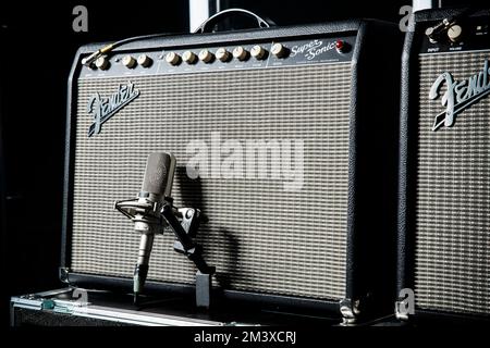 Fender Super Sonic bass guitar amplifiers used by Mike Kerr of Royal Blood on stage before a live show. Stock Photo