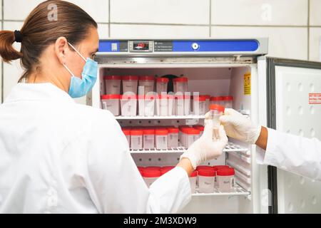 Researcher working in laboratory on water quality test Stock Photo