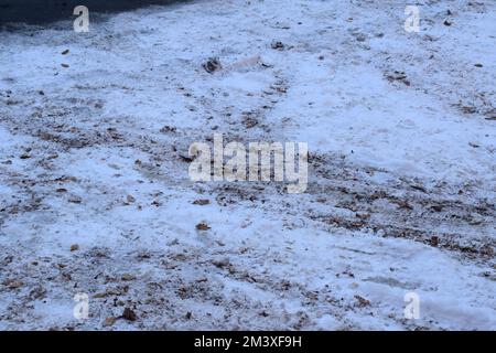 snow covered dirt road in winter Stock Photo
