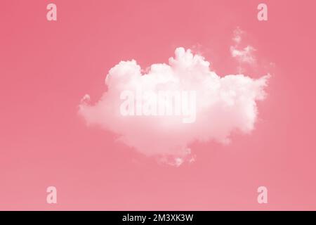 cute lovely single one small puffy white cloud against sky pink color tone for love day Stock Photo