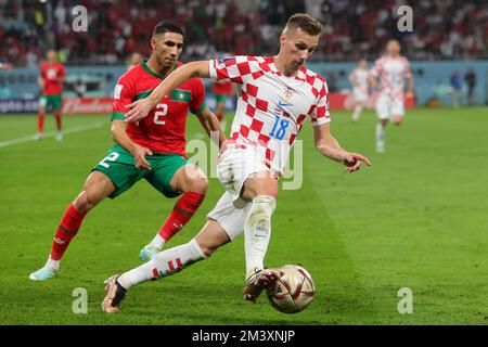 Doha, Qatar. 17th Dec, 2022. Mislav Orsic of Croatia dribbles the ball during the FIFA World Cup Qatar 2022 3rd place play-off match between Croatia and Morocco at Khalifa International Stadium, Doha, Qatar on 17 December 2022. Photo by Peter Dovgan. Editorial use only, license required for commercial use. No use in betting, games or a single club/league/player publications. Credit: UK Sports Pics Ltd/Alamy Live News Stock Photo