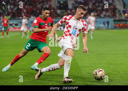 Doha, Qatar. 17th Dec, 2022. Mislav Orsic of Croatia dribbles the ball during the FIFA World Cup Qatar 2022 3rd place play-off match between Croatia and Morocco at Khalifa International Stadium, Doha, Qatar on 17 December 2022. Photo by Peter Dovgan. Editorial use only, license required for commercial use. No use in betting, games or a single club/league/player publications. Credit: UK Sports Pics Ltd/Alamy Live News Stock Photo