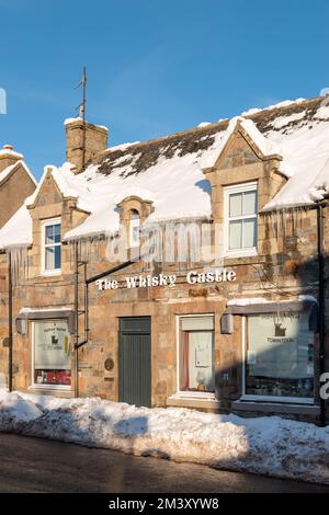 Tomintoul, Moray, UK. 17th Dec, 2022. This is The Whisky Castle Shop with its own ice. Credit: JASPERIMAGE/Alamy Live News Stock Photo