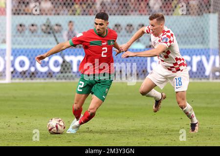 Achraf Hakimi of Morocco, Mislav Orsic of Croatia during the FIFA World Cup 2022, third place football match between Croatia and Morocco on December 17, 2022 at Khalifa International Stadium in Ar-Rayyan, Qatar - Photo Jean Catuffe / DPPI Stock Photo