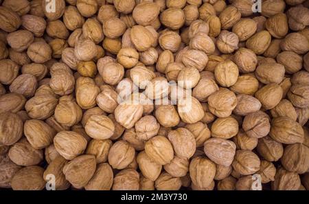 Walnuts filling the image, background of nuts Stock Photo