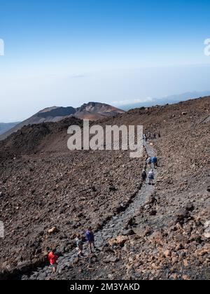 Tenerife, Spain, November 3rd 2022: People walking along the path to the viewpoint of Pico Viejo in el Teide, Tenerife, Canary Islands Stock Photo