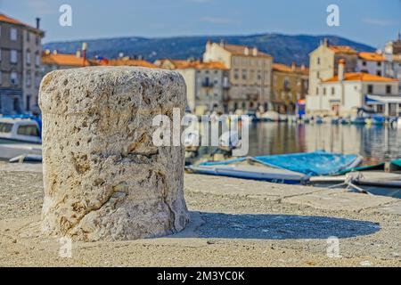 Stone pier in Cres old town port Croatia Stock Photo
