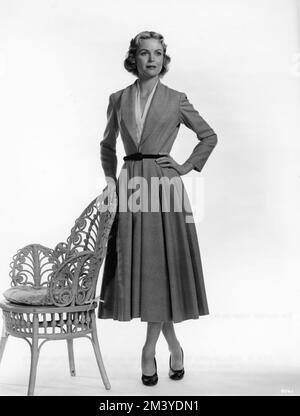 DOROTHY McGUIRE Fashion Portrait in costume designed by HELEN ROSE for the film INVITATION 1952 director GOTTFRIED REINHARDT producer Lawrence Weingarten Metro Goldwyn Mayer Stock Photo