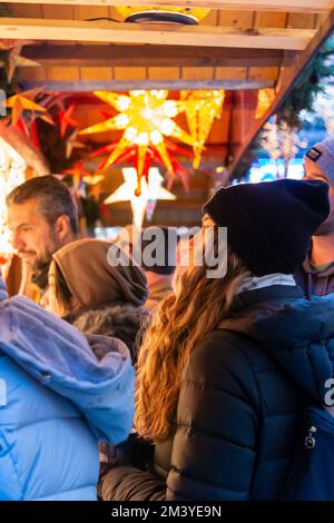 Chicago, IL, USA - December 16, 2022: Shoopers looking for Christmas-themed goods at the Christkindlmarket at the Daley Plaza in Chicago, Illinois. Stock Photo