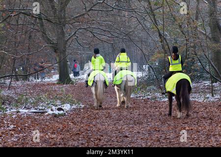 Farnham Common, Buckinghamshire, UK. 17th December, 2022. Horse riders out enjoying the last of the snow on another very frosty day in the beautiful woodlands at Burnham Beeches in Buckinghamshire. A yellow weather warning in place this evening for ice. Temperatures are, however, due to rise substantially tomorrow followed by heavy rain. Credit: Maureen McLean/Alamy Live News Stock Photo