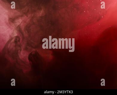 Dense red cloud smoke water Stock Photo