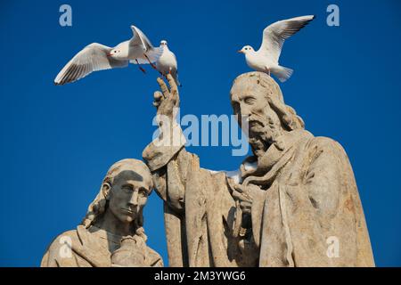 Statue of St. Cyril and St. Methodius on Charles bridge, Prague. Czech Republic. Stock Photo
