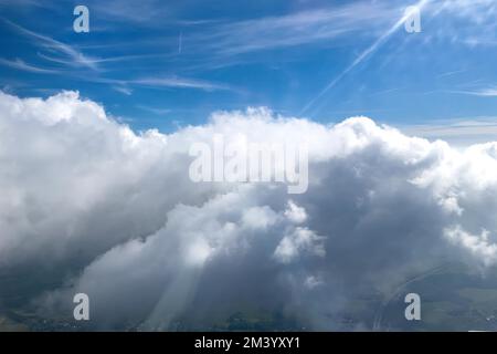 Close-up view from above of clouds (cumulus) Cluster clouds, in the background cirrus Cirrus clouds, Germany Stock Photo