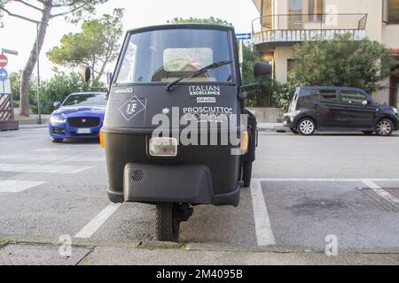 Small three-wheeled pick-up vehicle, Tuscany, Italy Stock Photo - Alamy