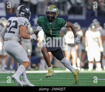 December 17, 2022: DeSoto High School head coach Claude Mathis holds up ...