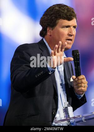 Phoenix, Arizona, USA. 17th Dec, 2022. Fox News host TUCKER CARLSON speaks at Turning Point USA's AmericaFest 2022.(Credit Image: © Brian Cahn/ZUMA Press Wire) Stock Photo