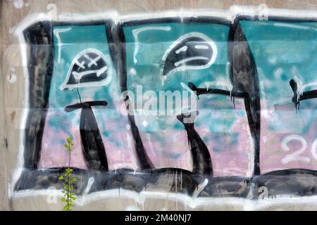 Graffiti blue, pink, purple words, written letters ARCHI. Graphic design made in a chaotic way when a paint can be washed on a concrete fence... Stock Photo