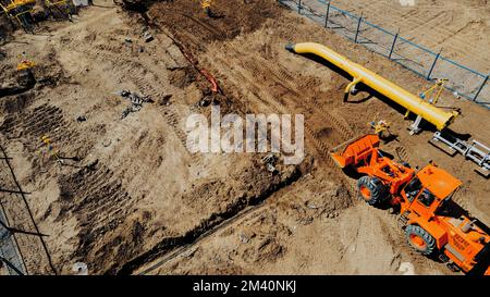 Excavator digging a trench for the pipeline. Excavation Stock Photo - Alamy
