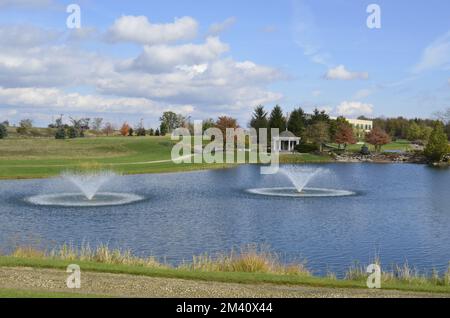 Wedding gazebo on the edge of a pond in a beautiful park Stock Photo